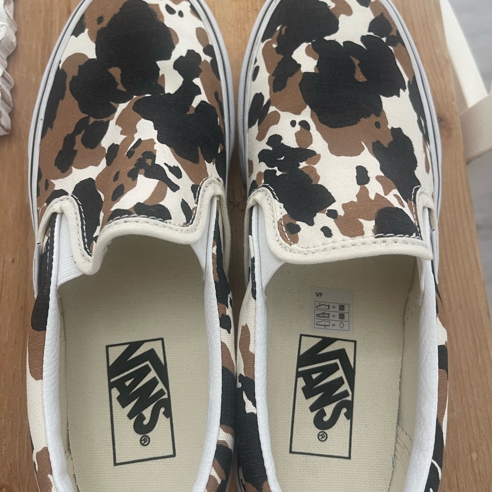 Vans Women 
Slip-On Sneakers - Black, Brown, and White